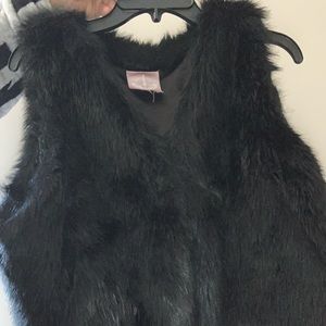 Black fur vest